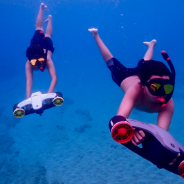 a person jumping in the air doing a trick on a skateboard