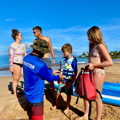 a group of people on a beach