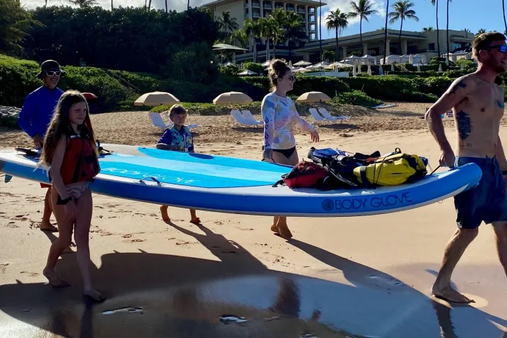 a group of people on a beach
